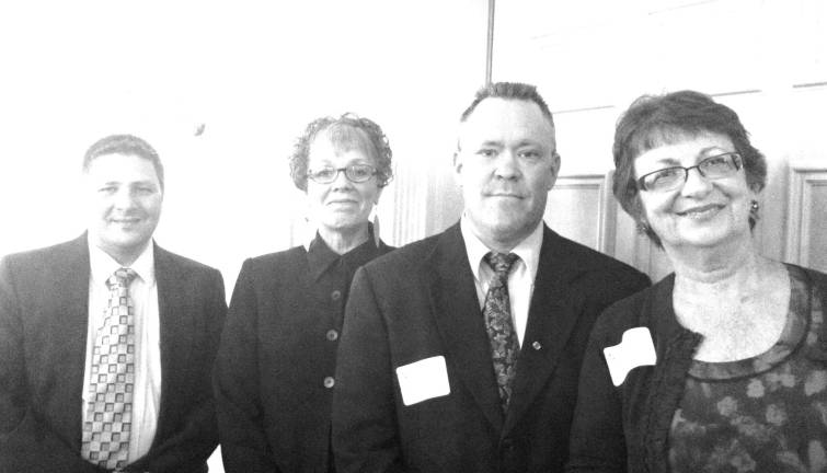 Pictured with SCREA Vice President Marie Kovacs — Detective Marty Lewis, Director Dianna Morrison and Det. Chris Grogan were speakers at the April 15 meeting of the Sussex County Retired Educators.
