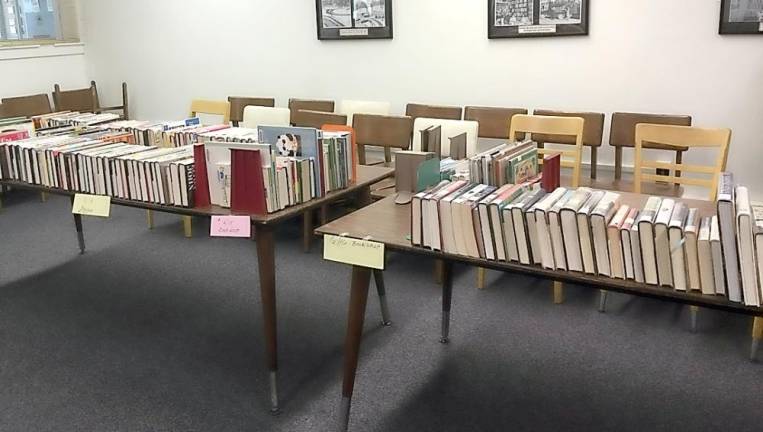 Returned books are quarantined for a minimum of 96 hours before being returned to circulation. Book drops are emptied daily onto tables or bins labelled by date.