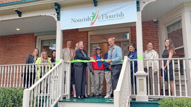 FP1 Project Self-Sufficiency staff and local leaders officially open the new Nourish to Flourish food pantry Thursday, Sept. 25 in Newton. (Photos by Grace ‘Gray’ Reed)