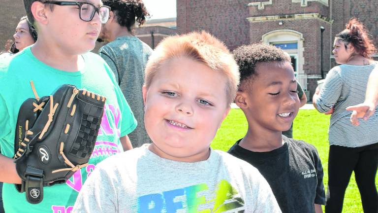 Colton Ross of Franklin holds his ice cream.