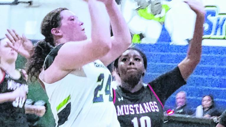 <b>Sussex Skylander's Marrisa Bouma (24) leaps during a shot. Bouma scored 8 points.</b>