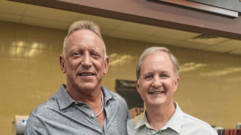 Clark Fredericks, left, with his defense attorney, Dan Perez. (Photos provided)