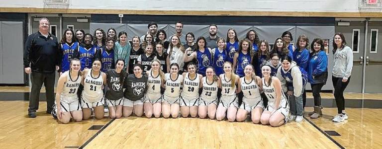 The Wallkill Valley team poses with alumni players from Franklin High School.
