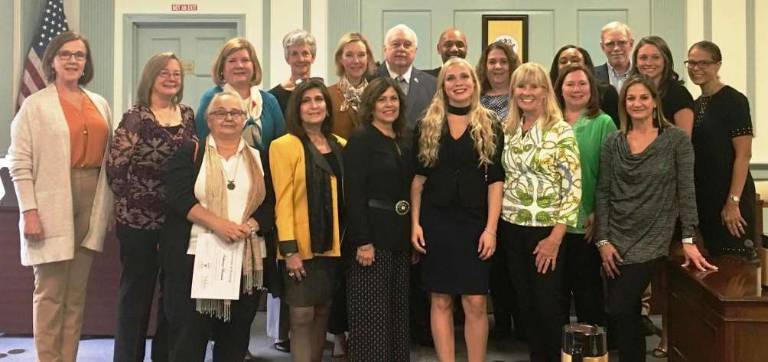 On May 17, 2018 volunteers were sworn in as Court Appointed Special Advocates for children at the Morris County Courthouse. Pictured Back Row L-R: Cheryl Bennett, Carolyn McKnight, Amy Evans, Kristen Dawson, Kathryn Leonard, Ellis Marples, Judge Wright, Mary Lou McGrath, Ashlee Caballero, Christopher Zwingle, Jianna Scarpa, Minerva Virola, Front Row L-R: Katharine Bambach, Gail Kross, Lois Davis, Katelyn Stetzel, Mollie Vogt, Dawn Filippone, Regina Farlekas, Not pictured: Debra Terlizzi