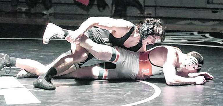 Wallkill Valley's Sam Goldy (black) handles Hackettstown's Evan Carr at 157 pounds. Carr won by decision (16-11).