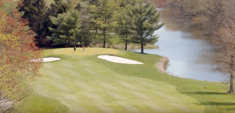 Golfers enjoy the verdant spring at Great Gorge Golf Course.