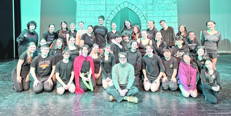 The cast of Shrek is shown with Christopher Sieber, who originated the role of Lord Farquaad on Broadway.
