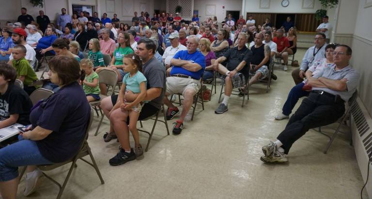 Photos by Vera Olinski Almost 200 residents attended the special meeting regarding Heater's Pond.