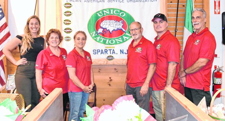 Emma DeLuca, Laura D'Uva, president of Sparta Unico, Teri-Ann Nocera, Gary D'Uva, Mike Schaaf and Vinny D'Aantoni pose for a photo.