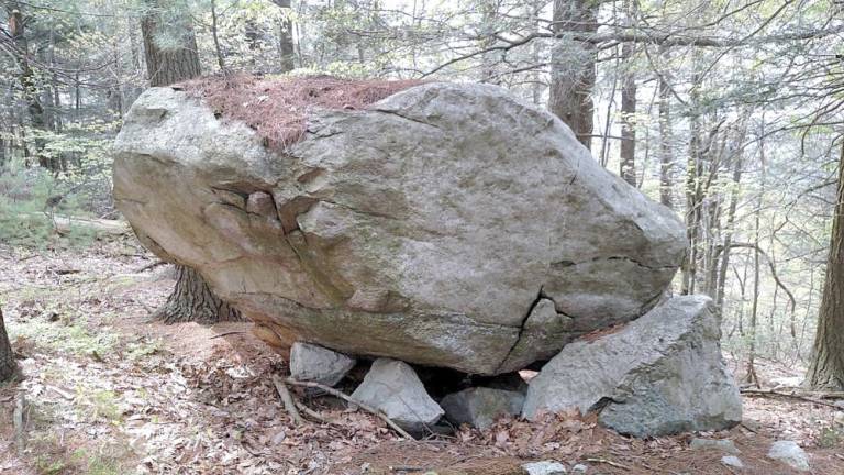 The Lily Pond stone, found atop Skytop in the Shawangunk Mountains, NY. It is “propped” with smaller stones underneath. Glenn Kreisberg has observed that the gap underneath the stone forms a triangle under certain light conditions (see next photo). Kreisberg has found similar formations in Wawayanda and Sterling Forest.