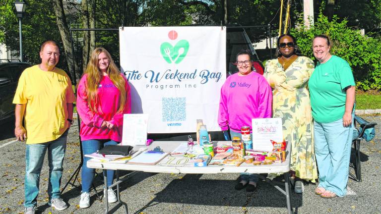 Dawn Costello is shown with workers from Valley National Bank.