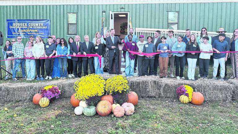 <b>The Sussex County Charter School for Technology cuts the ribbon on its new cafeteria.</b>