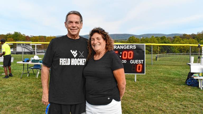 Irene Chernati, head field hockey coach at Wallkill Valley Regional High School, recently posted her 450th career victory. At left is her co-coach John Steiger. (Photos by Maria Kovic)