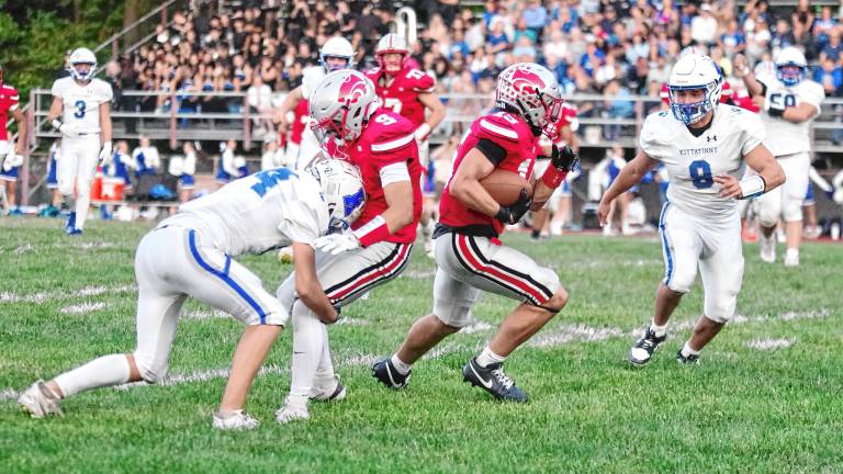 <b>HP1 High Point ball carrier Jerron Martress finds an opening in the game against Kittatinny on Friday, Sept. 12. He scored twice and rushed for 143 yards. The Wildcats won, 14-7. (Photos by George Leroy Hunter)</b>