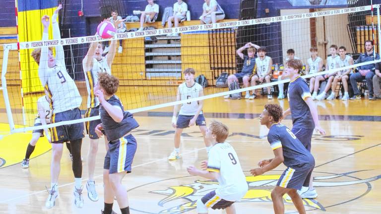 The Vikings and Falcons battle on the volleyball court April 23. Vernon won, 2-1. (Photos by George Leroy Hunter)