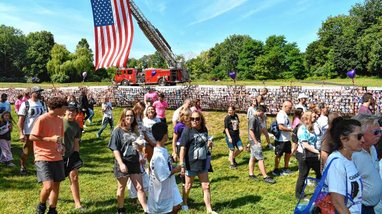 Participants set off on a one-mile walk through Franklin on Saturday, Aug. 2. (Photos by Maria Kovic)