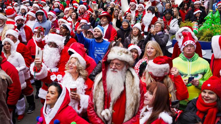 SantaCon attendees in New York City on Saturday, Dec. 13, 2025. (AP Photo/Ryan Murphy)