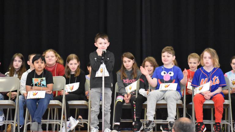 A speller considers his word during the 2024 Delaware Valley Elementary School spelling bee.