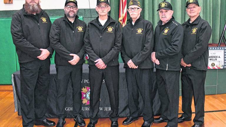 Stephen Davis, Matthew Lott, Tom Hart, Don Devore, Chief George Lott ( ret.) and Dion Derkach, all of Ogdensburg VFW Post 10152, pose for a photo.
