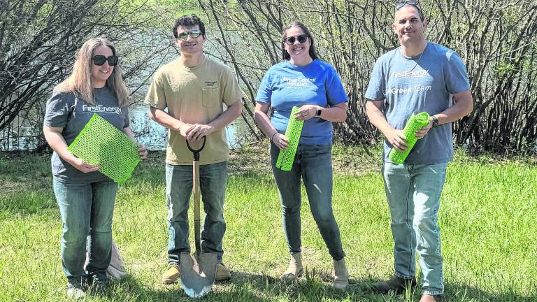 <b>From left, Amy Overman, JCP&amp;L Local Engagement Specialist; Andrew Saponara, FirstEnergy Environmental Coordinator; Tiffany Keil, JCP&amp;L Customer Account Specialist and Ray Vender, FirstEnergy Vegetation Management Specialist</b>