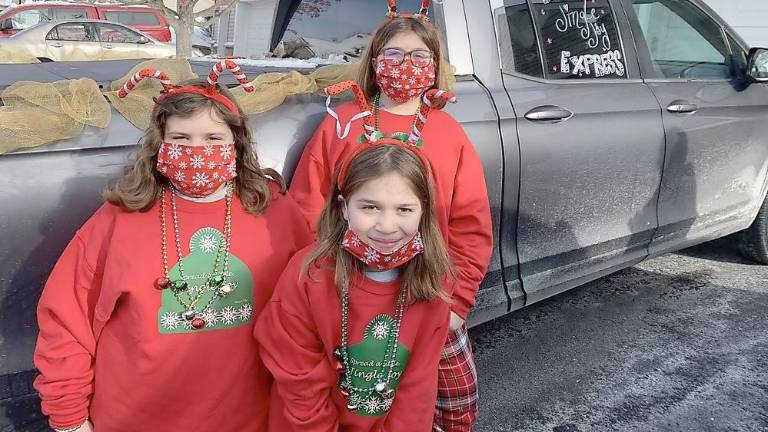 Girl Scouts spread ‘Jingle Joy’ to local seniors