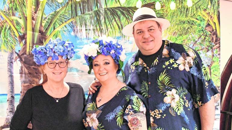 Barbara Holstein of Montague and Kerry Thompson of Franklin are shown with Jason Doyle, ex-chief of the Franklin Fire Dept.
