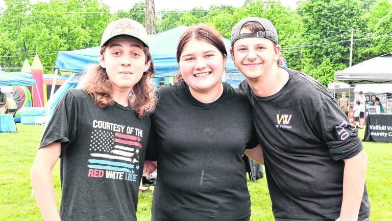 Vincenzo and AnnaMaria Formica of Franklin pose for a photo with Shane Crane of Ogdensburg.