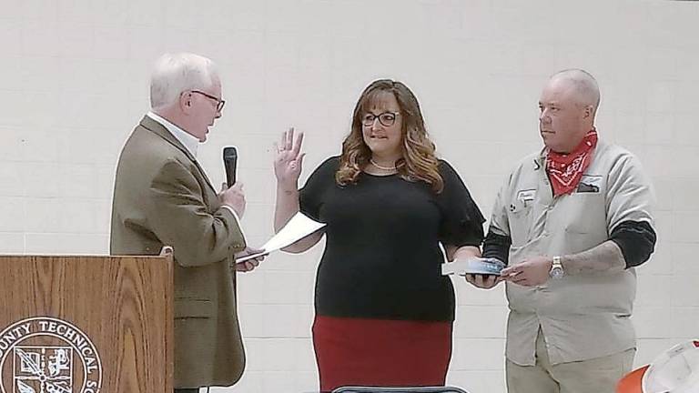 Jill Space being sworn in to fill the unexpired term for Sussex County Commissioner back in April.