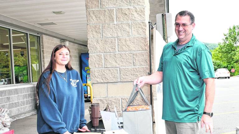 Joe Hendershot drops off a donation.