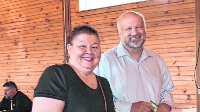 <b>Shannon Berganza of Wantage and Anthony Ventre of Sparta, owners of Brothers Pizza, pose for a photo.</b>