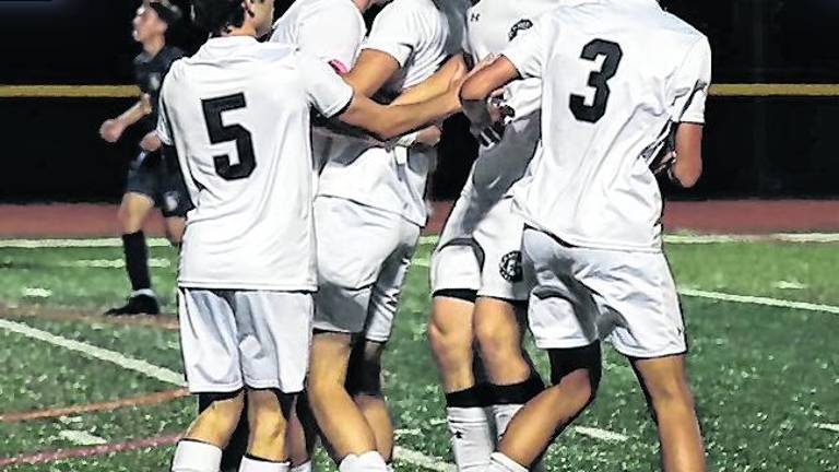 Wallkill Valley boys soccer team celebrates a win.
