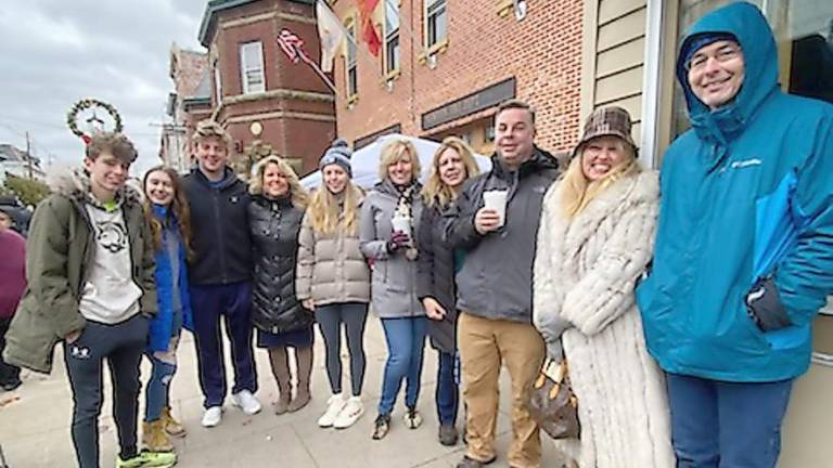 The extended Weber family gathered at the parade and fondly remembered how much their parents had loved it (Photo by Laurie Gordon)