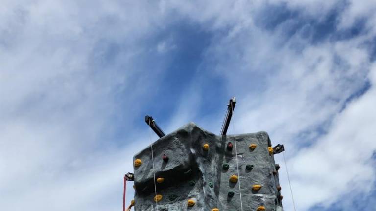 HD1 Ryan Rogers, 9, of Hamburg reaches the top of the rock wall at Hamburg Day 2023 on Sunday, Sept. 17. (Photos by Ava Lamorte)