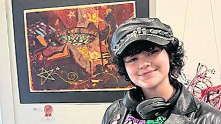 Sammy Barbato with their piece, Greasy Spoon.