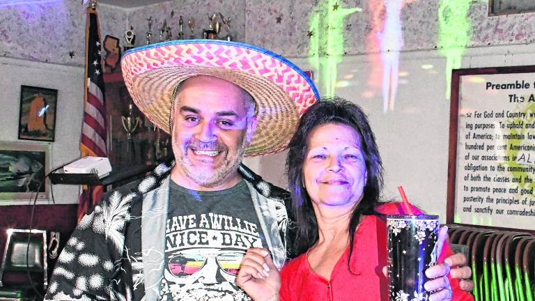 Joe McGaughran and Barbara Shuhnicki, both of Franklin, pose for a photo.