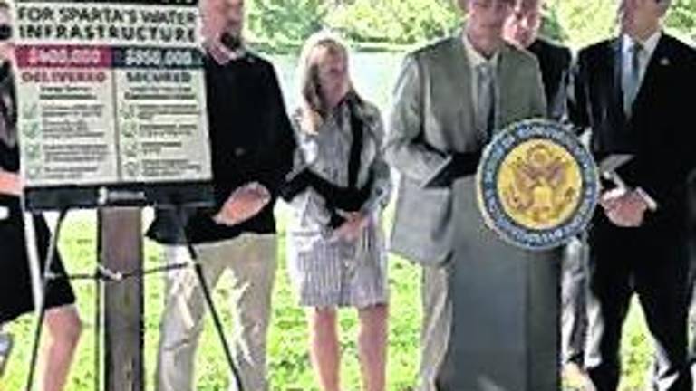 <b>The Sussex County commissioners are shown at an event highlighting improvements in Sparta’s water infrastructure.</b>