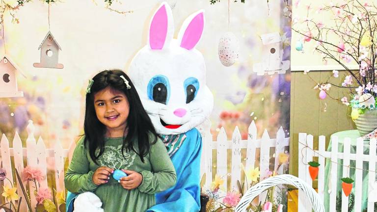 Chloe Chabla of Sussex poses with the Easter Bunny.